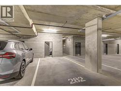 Third parking stall with concrete storage room - 