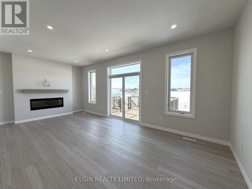 55 Woodcock Drive, Tillsonburg, ON - Indoor Photo Showing Living Room With Fireplace
