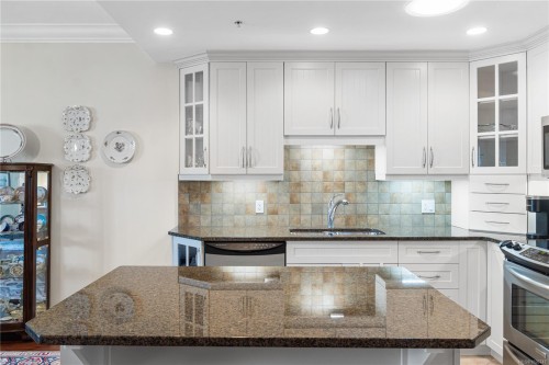 301-222 Second Ave, Qualicum Beach, BC - Indoor Photo Showing Kitchen With Double Sink With Upgraded Kitchen