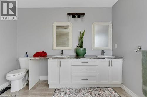 Full bath with double vanity and toilet - 148 Cowan Boulevard, Cambridge, ON - Indoor Photo Showing Bathroom
