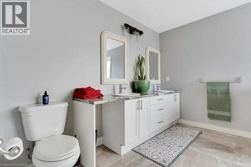 Bathroom with double vanity and toilet - 148 Cowan Boulevard, Cambridge, ON - Indoor Photo Showing Bathroom