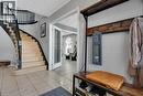 Foyer entrance featuring stairs and light tile patterned floors - 148 Cowan Boulevard, Cambridge, ON  - Indoor Photo Showing Other Room 