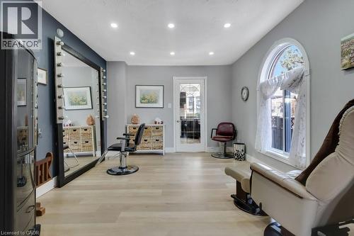 Living area featuring light wood finished floors and recessed lighting - 148 Cowan Boulevard, Cambridge, ON - Indoor