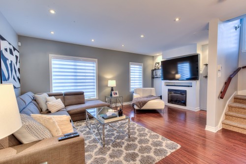 Living Room - 664 Rue Étienne-Lavoie, Laval (Sainte-Dorothée), QC - Indoor Photo Showing Living Room With Fireplace