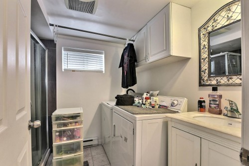 Salle de bains - 3291  - 3293 Rue De Chambly, Mascouche, QC - Indoor Photo Showing Laundry Room