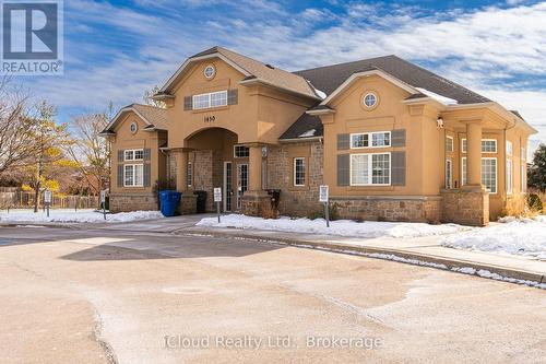 103 - 1450 Bishops Gate, Oakville, ON - Outdoor With Facade
