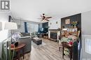 42 Macdowall Crescent, Prince Albert, SK  - Indoor Photo Showing Living Room With Fireplace 