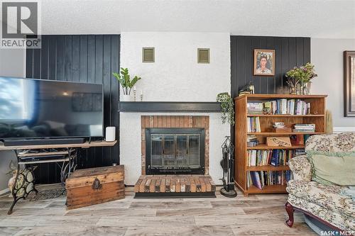 42 Macdowall Crescent, Prince Albert, SK - Indoor Photo Showing Living Room With Fireplace