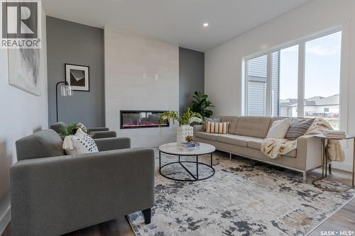 421 Traeger Close, Saskatoon, SK - Indoor Photo Showing Living Room With Fireplace