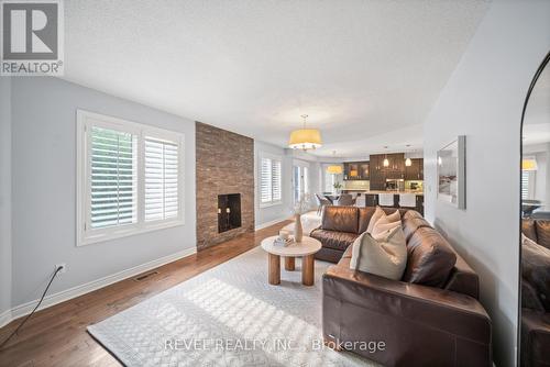 3723 Trelawny Circle, Mississauga, ON - Indoor Photo Showing Living Room With Fireplace