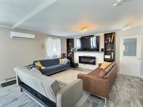 Salon - 1269 2E Rang N., Saint-Édouard-De-Fabre, QC - Indoor Photo Showing Living Room With Fireplace