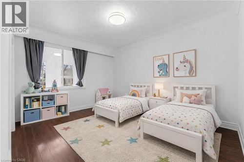 Fresh painted bedroom 1, new 2 color led light (virtual staged) - 40 West 3Rd Street, Hamilton, ON - Indoor Photo Showing Bedroom