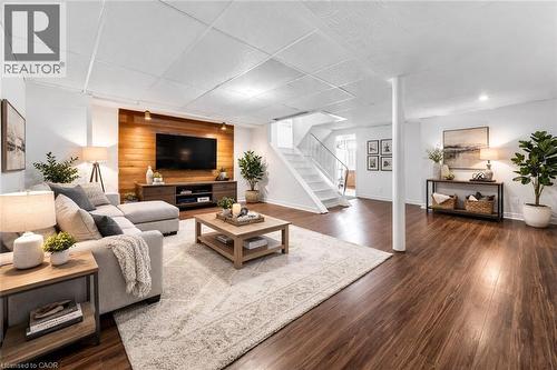 Finished basement living and recreation area (virtual staged) - 40 West 3Rd Street, Hamilton, ON - Indoor Photo Showing Living Room