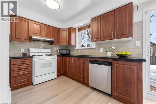 Fresh paint, new flooring, gas stove, built-in dishwasher - 40 West 3Rd Street, Hamilton, ON - Indoor Photo Showing Kitchen