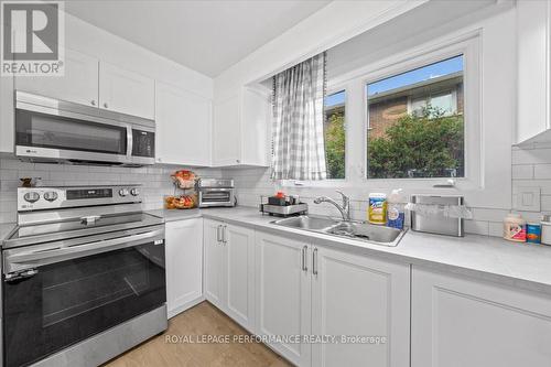 Apartment 1 - kitchen - 1702 Russell Road, Ottawa, ON - Indoor Photo Showing Kitchen With Double Sink