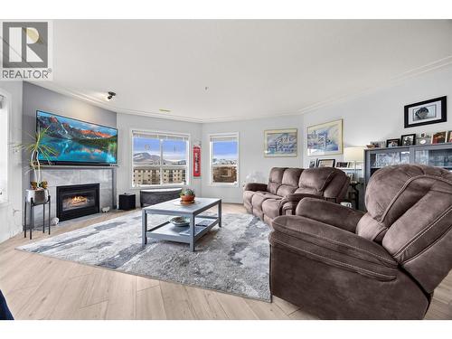Living - 1895 Ambrosi Road Unit# 502, Kelowna, BC - Indoor Photo Showing Living Room With Fireplace