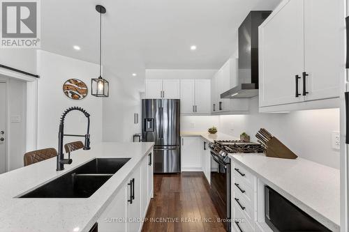 142 Ritchie Crescent, Springwater, ON - Indoor Photo Showing Kitchen With Double Sink With Upgraded Kitchen