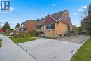 View of front of home featuring brick siding, a front yard, roof with shingles, and driveway - 549 Weber Street E, Kitchener, ON  - Outdoor 