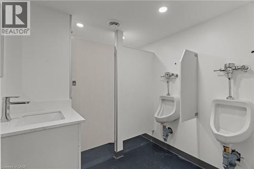 Bathroom with recessed lighting, vanity, and a bidet - 93 John Street S, Hamilton, ON 
