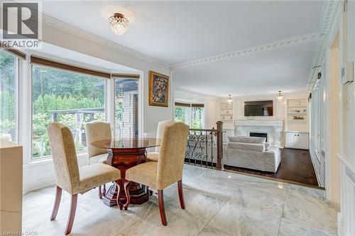 28 Stonegate Drive, Hamilton, ON - Indoor Photo Showing Dining Room With Fireplace