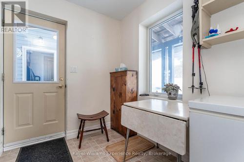 Hall to utility and side door - 257 15 Concession E, Tiny, ON 