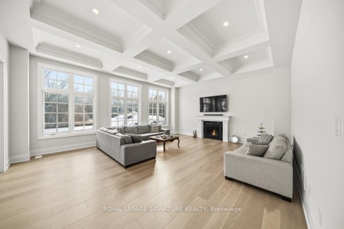 16 Gianvito Crescent, King, ON - Indoor Photo Showing Living Room With Fireplace