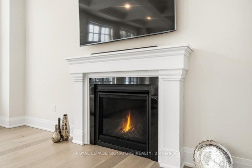 16 Gianvito Crescent, King, ON - Indoor Photo Showing Living Room With Fireplace