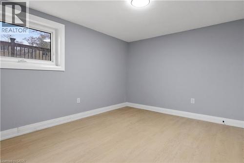 Empty room featuring light wood-style flooring and baseboards - 19 Broad Street, Brantford, ON - Indoor Photo Showing Other Room