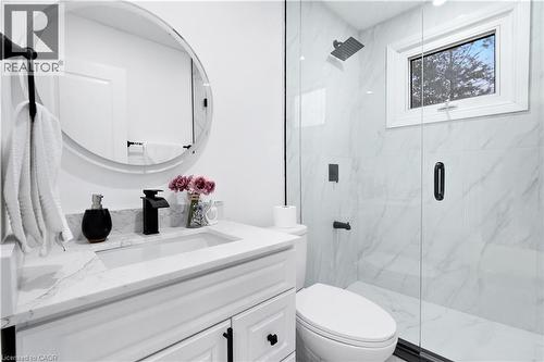 Bathroom featuring vanity and a marble finish shower - 19 Broad Street, Brantford, ON - Indoor Photo Showing Bathroom