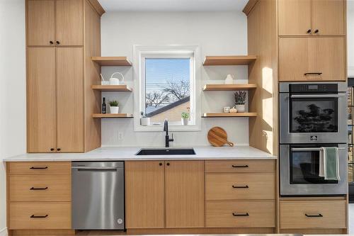 White oak Cabinets - 345 Beaverbrook Street, Winnipeg, MB - Indoor Photo Showing Kitchen