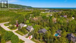 Tucked back from the street on just under 1/2 acre - 