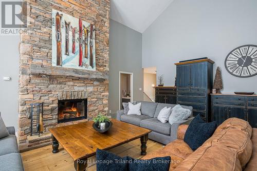 Efficient Rumford fireplace insert & rustic mantel - 19 Trails End, Collingwood, ON 