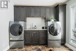 Built ins & quartz counters in main floor laundry - 