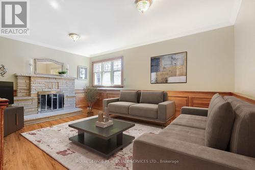 virtually staged- living room - 716 Cameron Court, Mississauga, ON - Indoor Photo Showing Living Room With Fireplace