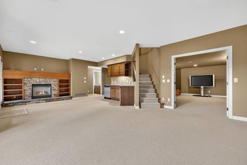 111-1910 Capistrano Drive, Kelowna, BC - Indoor With Fireplace