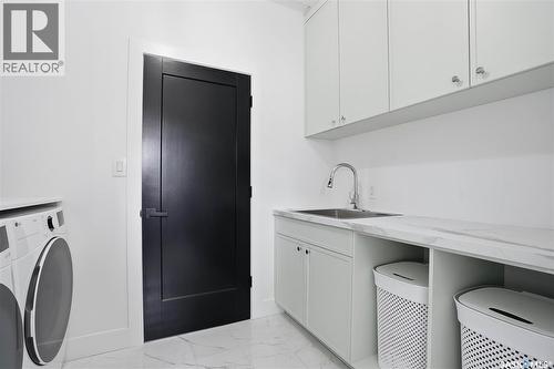 139 Woolf Bend, Saskatoon, SK - Indoor Photo Showing Laundry Room