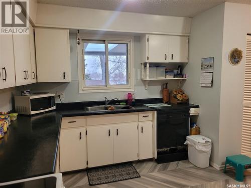 529 6Th Avenue E, Assiniboia, SK - Indoor Photo Showing Kitchen With Double Sink