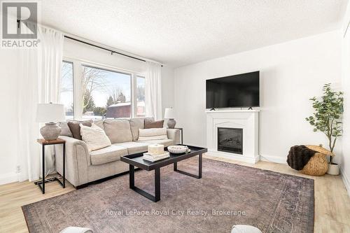 5749 Second Line E, Guelph/Eramosa, ON - Indoor Photo Showing Living Room With Fireplace