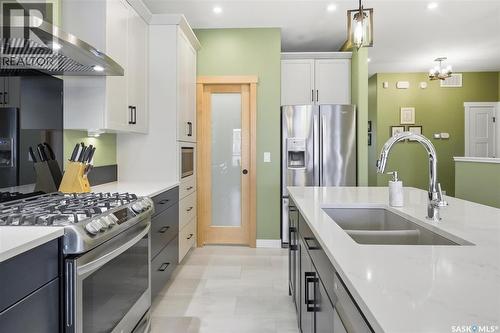 132 Forsey Avenue, Saskatoon, SK - Indoor Photo Showing Kitchen With Stainless Steel Kitchen With Double Sink With Upgraded Kitchen