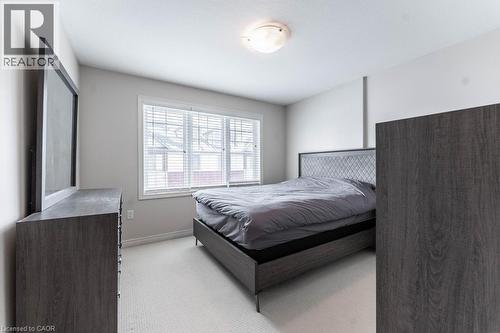 Bedroom with baseboards and light colored carpet - 4 Andruss Lane, Ancaster, ON - Indoor Photo Showing Bedroom
