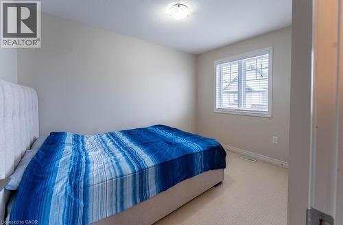 Bedroom featuring carpet floors and baseboards - 4 Andruss Lane, Ancaster, ON - Indoor Photo Showing Bedroom