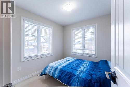Bedroom featuring carpet floors and baseboards - 4 Andruss Lane, Ancaster, ON - Indoor Photo Showing Bedroom