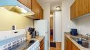 1304-2015 2Nd Street, Cranbrook, BC  - Indoor Photo Showing Kitchen With Double Sink 