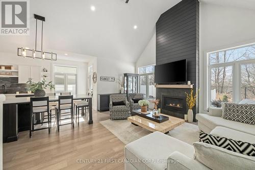 35 Compass Trail, Central Elgin, ON - Indoor Photo Showing Living Room With Fireplace