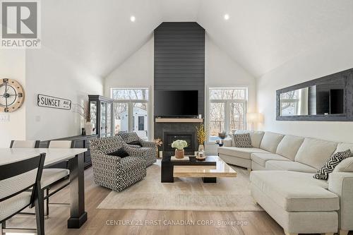 35 Compass Trail, Central Elgin, ON - Indoor Photo Showing Living Room With Fireplace