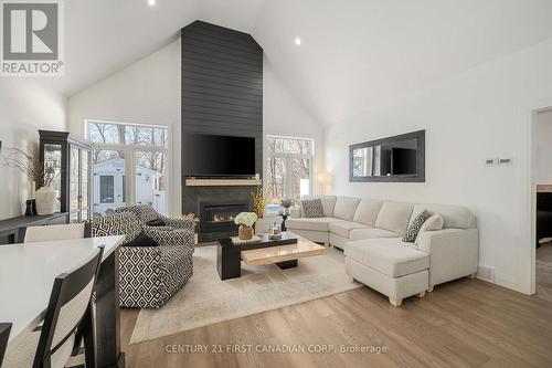 35 Compass Trail, Central Elgin, ON - Indoor Photo Showing Living Room With Fireplace