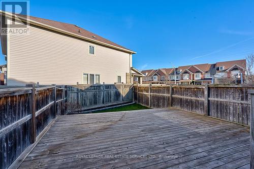Fully Fenced Backyard with an Oversized Deck - 3221 Sharp Road, Burlington, ON - Outdoor With Deck Patio Veranda With Exterior