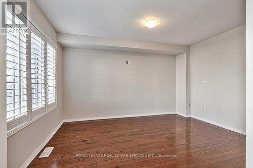 Family Room with Gleaming Hardwood Flooring - 3221 Sharp Road, Burlington, ON - Indoor Photo Showing Other Room