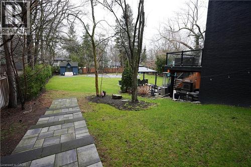 Fenced backyard featuring a patio and an outbuilding - 1436 Crescent Road, Mississauga, ON - Outdoor