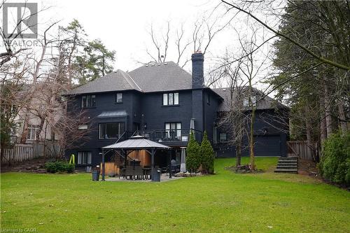 Back of property with a chimney, a patio, and a gazebo - 1436 Crescent Road, Mississauga, ON - Outdoor With Deck Patio Veranda